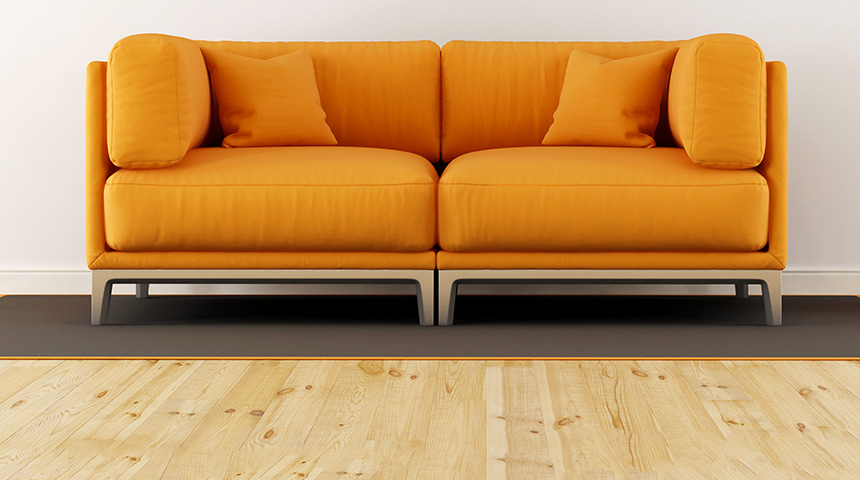 Little Girl Jumping on a Sofa