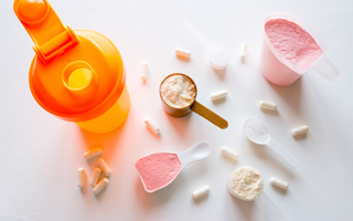 Orange Water Bottle and Capsules