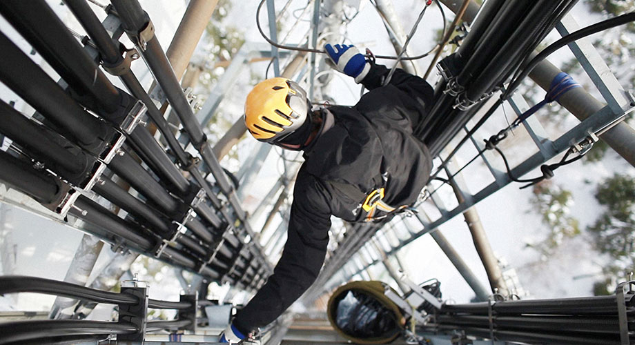 Worker on telecommunication tower