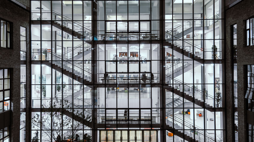 office building during night time view from outside to inside