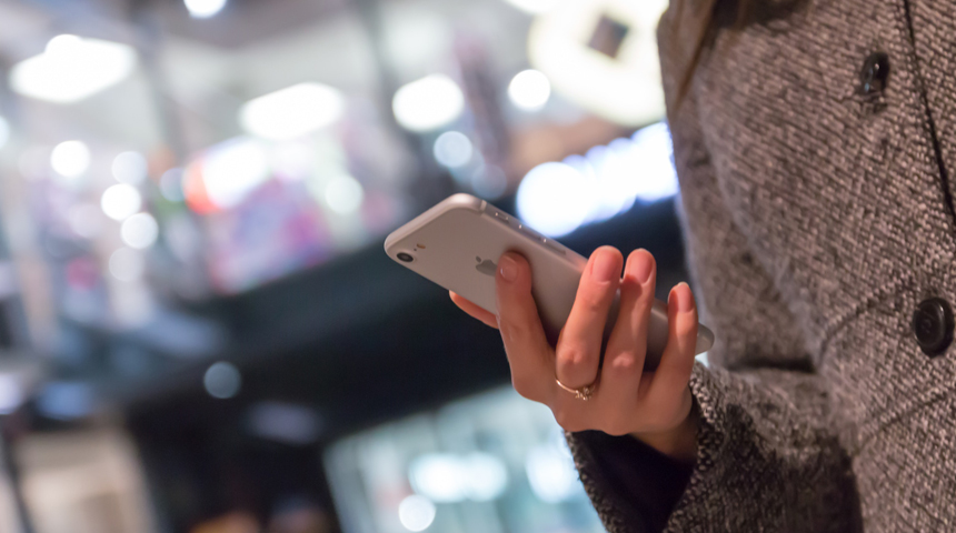 Woman holding a smartphone