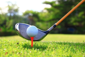 Golf ball and club with orange tee